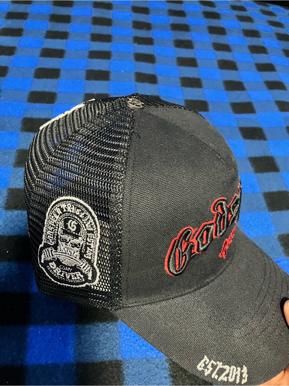 Black Mesh Trucker Cap with Red Embroidery
